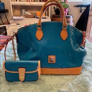 Dooney and Bourke patent hand bag with wristlet.